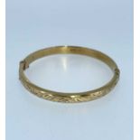 9CT GOLD ENGRAVED BANGLE, 10.4gms Provenance: private collection Vale of Glamorgan, consigned via