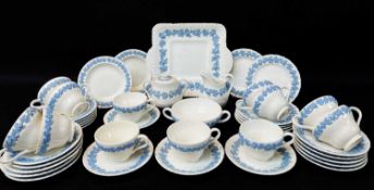 WEDGWOOD 'QUEENSWARE' BLUE & WHITE MOULDED PART TEA SET, comprising twelve cups, seven circular