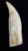 19TH CENTURY SCRIMSHAW WHALE TOOTH, decorated with figures of Napoleon and Josephine, 17cms high