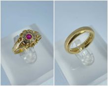 GOLD RINGS comprising 18ct gold ruby and diamond cluster ring, together with an 18ct gold wedding
