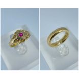 GOLD RINGS comprising 18ct gold ruby and diamond cluster ring, together with an 18ct gold wedding