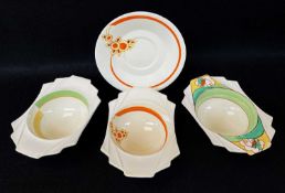 FOUR ITEMS OF CLARICE CLIFF 'BIZARRE' comprising three breakfast bowls with Art Deco handles and a
