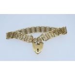 9CT GOLD GATE BRACELET, heart shaped padlock, 15.5gms Provenance: deceased estate Carmarthenshire,