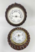 TWO SIMILAR WHEEL BAROMETERS, circular with rope twist design, one marked 'J. Rowley Hull' (2)