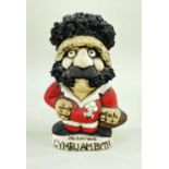 JOHN HUGHES CERAMIC GROGG of a Welsh rugby player possibly Mervyn Davies, boasting black mutton-chop