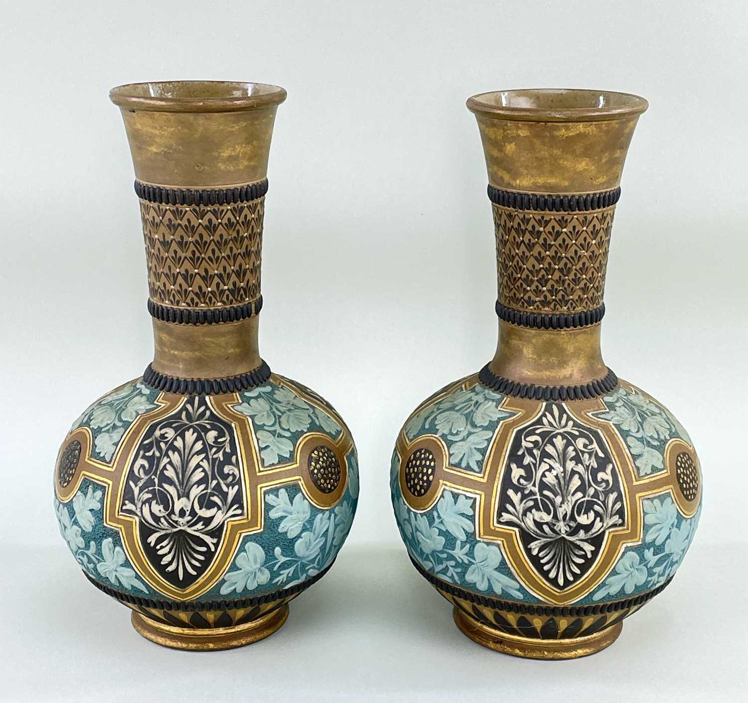 PAIR OF DOULTON SILICON WARE VASES, globular shape with foliate decoration, incised initials 'MMR'