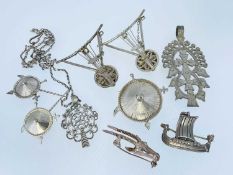 WHITE METAL & SILVER JEWELLERY comprising five various bar brooches, two in the form of a krar,