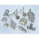 WHITE METAL & SILVER JEWELLERY comprising five various bar brooches, two in the form of a krar,