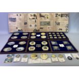 WINDSOR MINT COINS COLLECTION MILITARY/WAR - 65 coins in all to include two cased sets of four