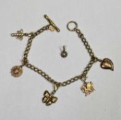 CLOGAU GOLD CHARM BRACELET - with T bar and five charms, one heart shaped with the word 'Cariad',