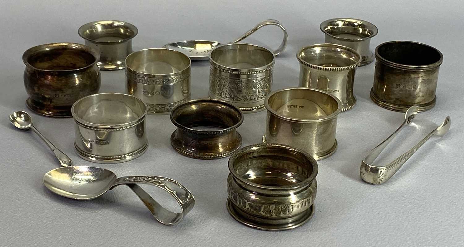 SMALL SILVER - 12 pieces to include nine hallmarked napkin rings, child's pusher spoon, pair of