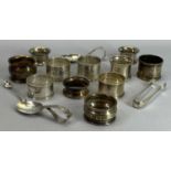 SMALL SILVER - 12 pieces to include nine hallmarked napkin rings, child's pusher spoon, pair of