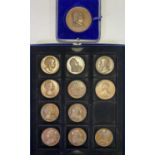 FRENCH COIN TYPE BRONZED MEDALLIONS X 13 - to include an individually cased 5.5cms diameter