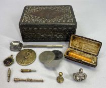 VINTAGE CARVED HARDWOOD LIDDED BOX & COLLECTABLE CONTENTS to include a cased amber cigarette holder,