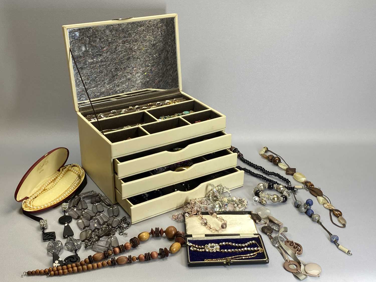 MODERN MIRRORED INTERIOR JEWELLERY CASE - with good contents and additional costume jewellery,