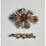 9CT GOLD BROOCHES (2) - to include a ruby and paste set yellow and white gold floral brooch, 5.5 x