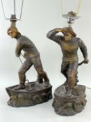 AFTER HENRI FUGERE (French 1872-1944) pair of patinated metallic figures adapted to table lights