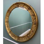 VICTORIAN PRESSED COPPER & GILDED CIRCULAR MIRROR, decoration of national flowers and Rococco