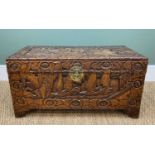 CHINESE CARVED CAMPHORWOOD CHEST, top decorated with figures beside pavilion and pair sailing,