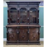 LARGE RENAISSANCE REVIVAL CARVED OAK CABINET, with lion mask and metal ring cornice, three arched