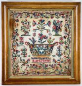 ELLEN DAVIES WOOLWORK SAMPLER 1890, in bright colours, with basin of flowers, further stems of