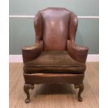 19TH CENTURY WINGBACK ARMCHAIR, of shapely form on carved cabriole front supports