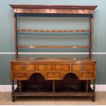 GEORGE III OAK & FRUITWOOD WELSH DRESSER, South Wales, the open potboard base below double arched