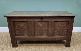 19TH CENTURY OAK COFFER / BLANKET CHEST, having a three panelled front with architectural carving