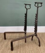 PAIR OF WROUGHT IRON FIRE DOGS, with circular disk finials and serrated ratchet stems, 70h x 22w x