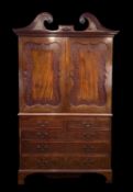 19TH CENTURY MAHOGANY LINEN PRESS, pierced swan neck pediment with central applied oval patera