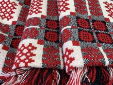 TRADITIONAL WELSH WOOLLEN BLANKET - mainly red ground reversible pattern with tasselled ends, 230