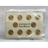 ELIZABETH II SEALED PACK SET OF 10 GOLD FULL SOVEREIGNS - display mounted on card, dated 1957, 58,