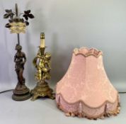 CLASSICAL STYLE TABLE LAMPS (2) - to include a gilded example of a cherubic figure seated on fruit