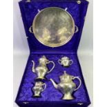 CONTINENTAL 4 PIECE EPNS TEA SERVICE - with circular two-handled serving tray in a purple velvet