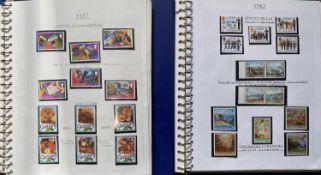 STAMPS - Guernsey, two albums mint and used, 1941 - 2009 (high value)