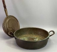 ANTIQUE COPPER TWIN HANDLED PAN and a Victorian copper long handled warming pan, 48.5cms across
