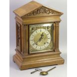 W & H TWIN COILED GONG STRIKE MANTEL CLOCK - walnut architectural case with carved Corinthian cap