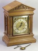 W & H TWIN COILED GONG STRIKE MANTEL CLOCK - walnut architectural case with carved Corinthian cap