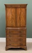 REPRODUCTION MAHOGANY LOUNGE CUPBOARD having upper twin doors and interior shelves, the central