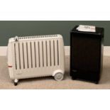 HEATERS - a Dimplex electric heater on castors with remote control E/T and a calor gas heater