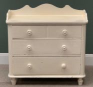 VINTAGE PINE PAINTED CHEST of three long drawers with turned knobs and a railback top, 84cms H,