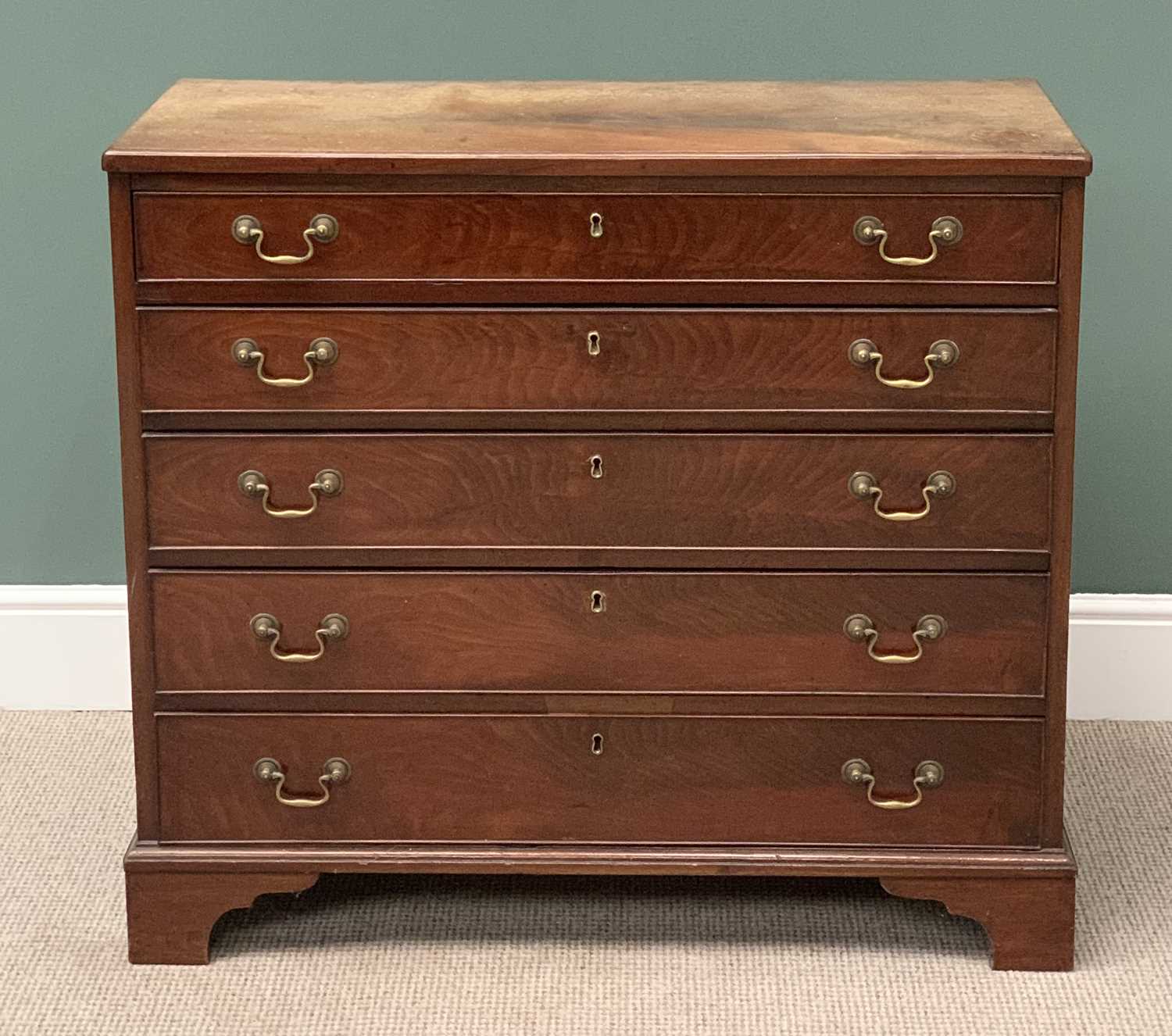 ANTIQUE MAHOGANY CHEST OF FIVE LONG DRAWERS with brass swan neck handles, on bracket supports, 90cms