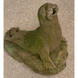 STONEWARE GARDEN ORNAMENT of a seal, 61cms H, 30cms W, 52cms D