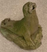 STONEWARE GARDEN ORNAMENT of a seal, 61cms H, 30cms W, 52cms D
