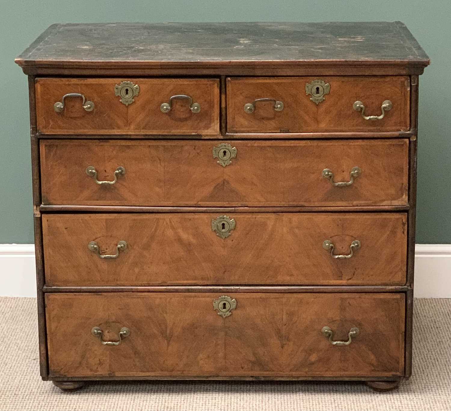 ANTIQUE FIGURED MAHOGANY CHEST of two short over three long drawers, with brass drop handles and