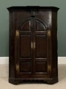 ANTIQUE OAK WALL HANGING TWO DOOR CORNER CUPBOARD with fielded panels and brass hinges, a fine
