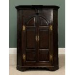 ANTIQUE OAK WALL HANGING TWO DOOR CORNER CUPBOARD with fielded panels and brass hinges, a fine