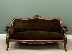 VICTORIAN MAHOGANY BUTTON BACK SETTEE with shaped and carved detail, scrolled arms and feet, 87cms