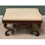 ANTIQUE MAHOGANY UPHOLSTERED TOP FOOTSTOOL on scrolled supports, 42cms H, 79cms W, 63cms D