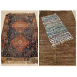 EASTERN RUG with tasselled ends, multiple pattern border and double diamond central motif, 86 x